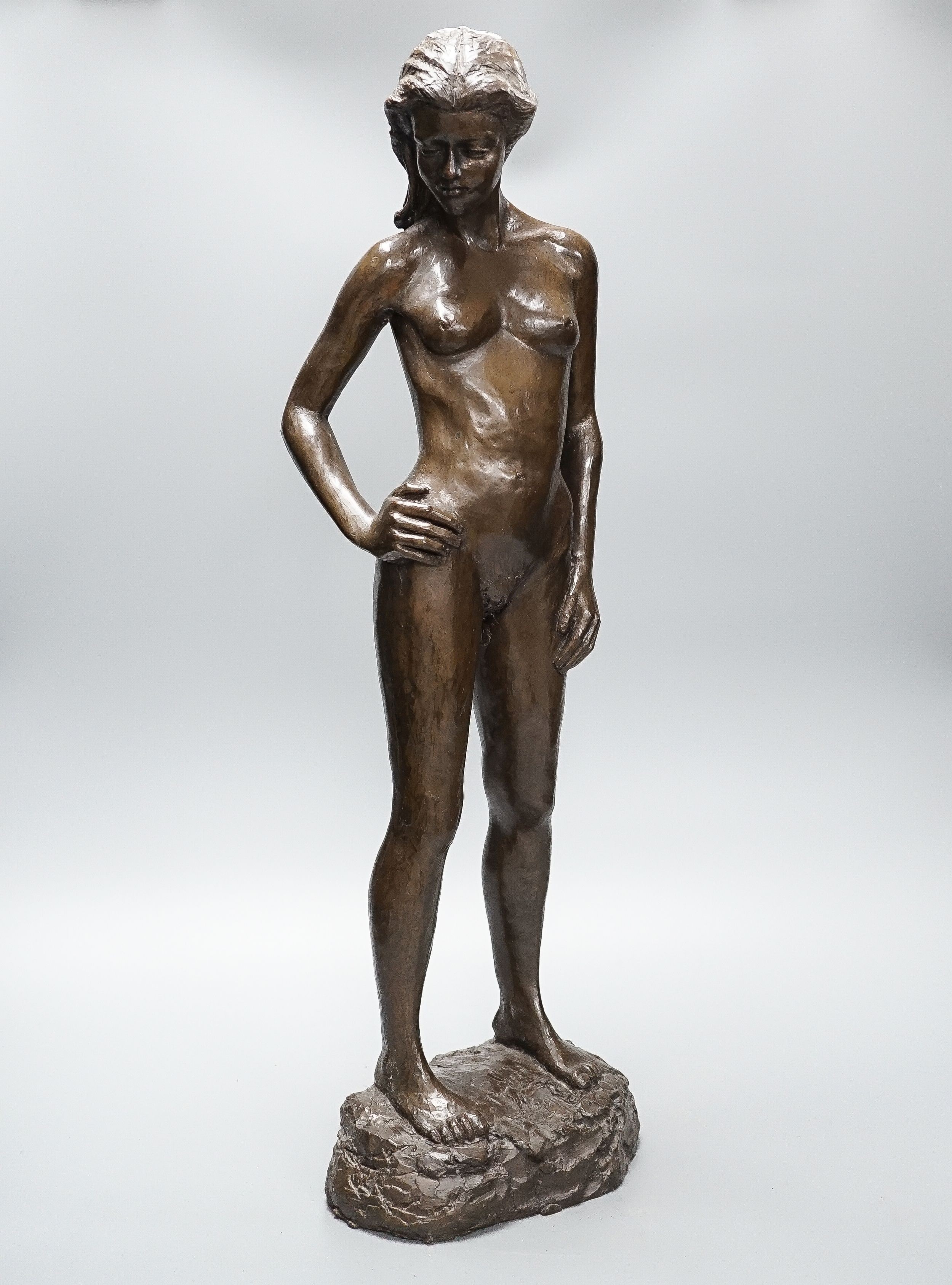 A large bronzed resin figure “Fiona standing” signed Kerek ‘83 64cm